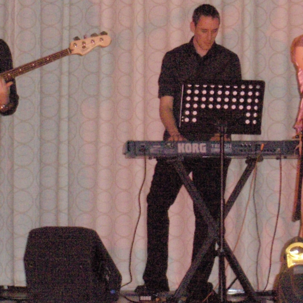 Icebreeze (aka Nick Webber) playing Korg Triton Extreme on stage at a live show